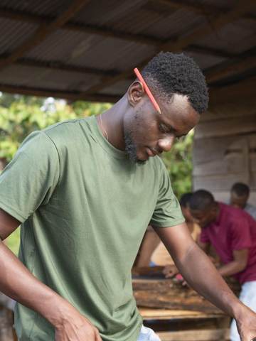 A carpenter at work in his workshop